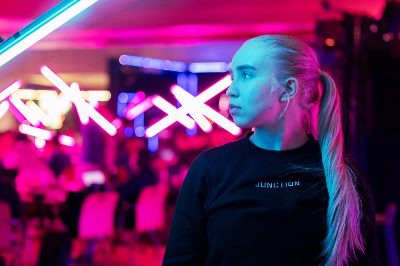 Junction - Participant under the event neon lights